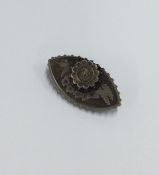 An attractive Victorian boat shaped brooch decorat