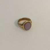 A gent's 18 carat signet ring with intaglio. Appro