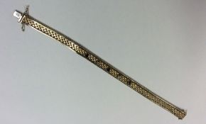 A sapphire and diamond line bracelet in 9 carat go