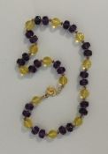 An attractive silver, amethyst and citrine necklac