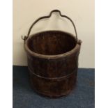 A good Antique hardwood and cast iron peat bucket