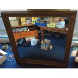 A good mirror in ornate carved gilt frame. Approx.