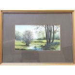 E L LITTLEWOOD: A framed and glazed watercolour de