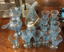 A collection of good blue glass cups together with