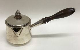 A good Georgian hinged top silver brandy pan with