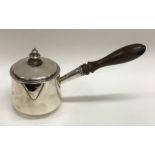 A good Georgian hinged top silver brandy pan with