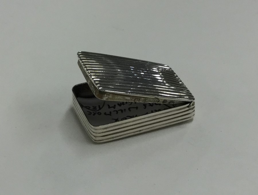 A small Georgian silver reeded snuff box with hing - Image 2 of 2