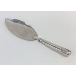 A plain Georgian silver fish slice of tapering for
