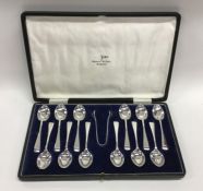 A good cased set of twelve silver teaspoons togeth