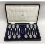 A good cased set of twelve silver teaspoons togeth