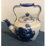 A large blue and white pottery kettle. Est. £20 -