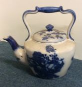 A large blue and white pottery kettle. Est. £20 -
