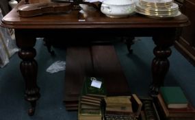 A good Victorian mahogany extending table on taper