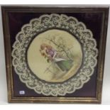 A framed and glazed silk embroidery of a girl with