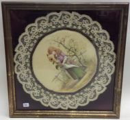 A framed and glazed silk embroidery of a girl with