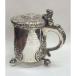 A massive silver lidded tankard, the lid embossed