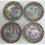 A set of four Chinese Canton dishes decorated with