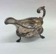 An early Georgian silver sauce boat with textured