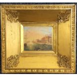 A gilt framed picture of an Italian scene in brigh