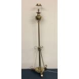 A tall brass lamp mounted with reservoir. Est. £60