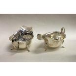 Two silver sauce boats with card cut rims. Sheffie