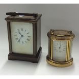 A brass cased carriage clock together with one oth
