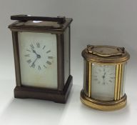 A brass cased carriage clock together with one oth