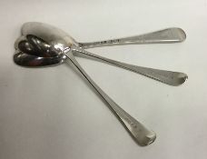 Three Georgian silver dessert spoons. Various date