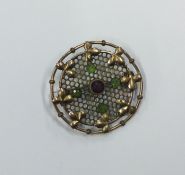 A gilt circular Suffragette brooch. Approx. 5 gram