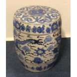 A large blue and white Chinese pottery seat mounte