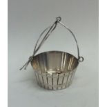 An unusual tea infuser in the form of a bucket wit