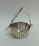 An unusual tea infuser in the form of a bucket wit