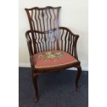 An Edwardian mahogany chair with tapestry seat. Es