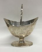 A Georgian silver boat shaped sugar basket engrave