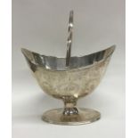 A Georgian silver boat shaped sugar basket engrave