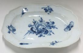 A Dresden side plate decorated with flowers and le