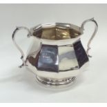 A good Edwardian silver panelled sugar bowl with g