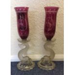 A pair of stylish moulded glass lamps with cranber