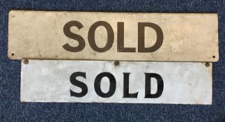 A double sided enamel 'Sold' sign together with on