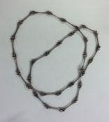 A modernistic silver necklace. Approx. 74 grams. E