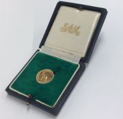 A 1966 10 Shilling gold coin in fitted box. Est. £