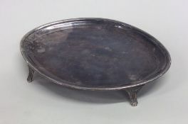 A good Georgian boat shaped silver teapot stand on