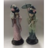 A pair of Lladro figures of Chinese ladies in kimo