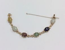 A gold mounted agate bracelet with concealed clasp