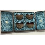 A boxed set of Continental filigree silver salts w