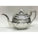 A good Georgian silver teapot on ball feet attract