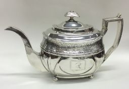 A good Georgian silver teapot on ball feet attract