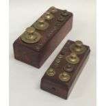 Two sets of travelling brass weights. Est. £30 - £