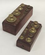 Two sets of travelling brass weights. Est. £30 - £