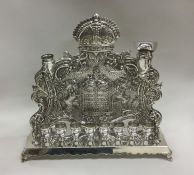 A massive Jewish silver menorah / hanukiah cast wi